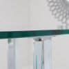 abingdon stowaway dining table close up glass top 1 1