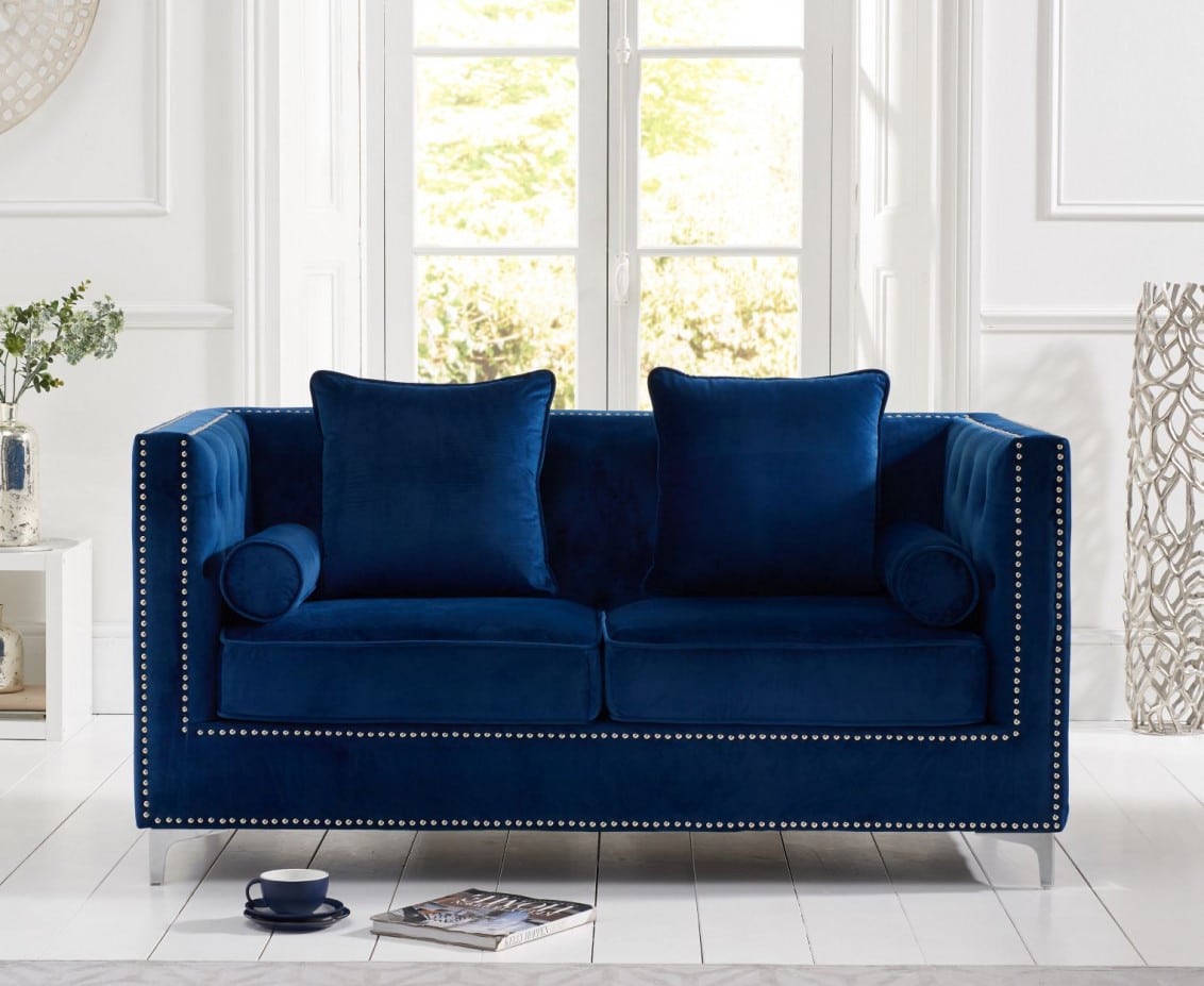 Blue velvet 2 seater sofa clearance