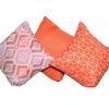2 Orange fleur patterned Scatter Cushions group scaled